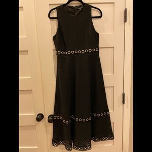 Gianni Bini dress. Black w/gold grommets. Size 10. Worn once! Beautiful dress!